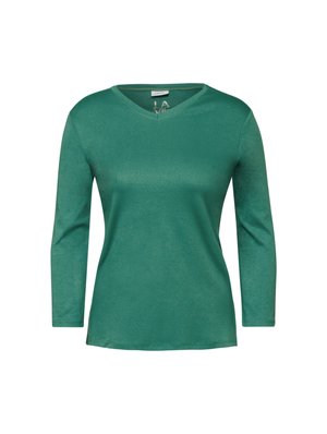 Groene v-hals langwerpige t-shirt gemaakt van zacht, rekbaar stof. Bevat een gladde textuur en een klassiek ontwerp met een ontspannen pasvorm.