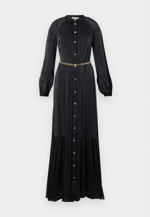 Juodas maxi suknelė, pagaminta iš lygaus audinio, su ilgomis rankovėmis, mygtukų užsegimu priekyje ir auksine grandinės juostos juosmenyje. Platėjantis sijonas.