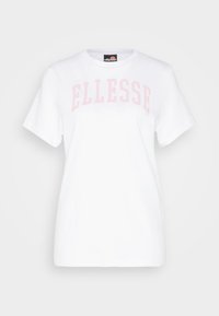 White short-sleeve t-shirt made of cotton, featuring a light pink "ELLESSE" logo across the chest. Round neckline and relaxed fit.