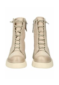 Stivaletti beige alla caviglia con una texture liscia, dotati di una zip frontale, design con lacci e una suola spessa bianca per trazione e supporto.