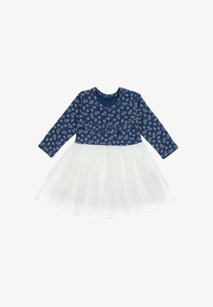 Granatowa sukienka z długimi rękawami, wzorzysta góra z małymi liśćmi oraz biała spódnica z tiulu. Marszczenie w talii. Miękki bawełniany materiał.