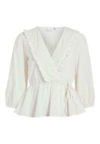 Blusa bianca avvolgente con bordo arruffato, maniche a sbuffo lunghe, vita con fiocco e tessuto leggero. Morbida al tatto e con un fit fluido.