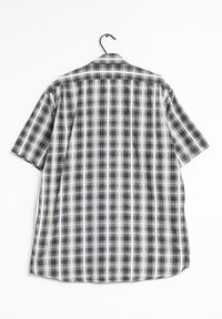 Camicia a maniche corte in tessuto a scacchi bianco e nero con colletto button-down, tessuto morbido e orlo dritto.