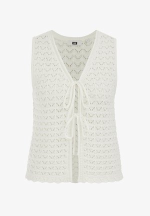 Valge heegeldatud varrukateta vest sillerdava äärega ja kahe ees oleva lipsukinnitusega, millel on V-kaelusega disain.