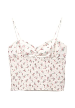White floral crop top with thin adjustable straps, featuring a gathered texture and small pink and green rose patterns throughout.