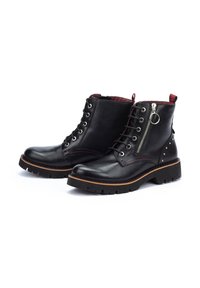 Black leather ankle boots with a textured finish, featuring a side zipper, lace-up front, silver hardware, and a thick, rugged sole.