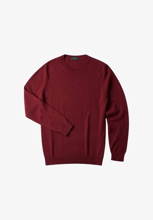 Burgundy knitted sweater with a round neck, long sleeves, and ribbed cuffs. Smooth texture, casual design, no notable patterns.