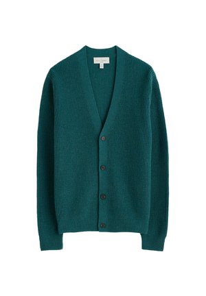 Teal strikket cardigan med v-udskæring, lange ærmer og seks brune knapper fortil. Struktureret stof og ribbede manchetter og kant.