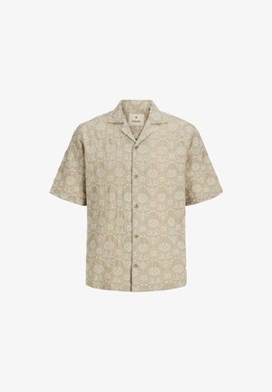 Košulja kratkih rukava u bež boji s cvjetnim uzorkom u bijeloj boji. Ima šiljati ovratnik i zatvaranje na gumbe. Tekstuirani dizajn tkanine.