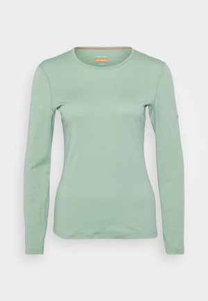 Mikina s dlhým rukávom v svetlej mätovej farbe, vyrobená z jemného materiálu. Obsahuje okrúhly výstrih a minimalizované švy.