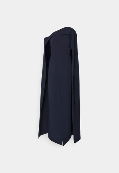 Abito da sera blu navy, senza spalline, con uno spacco laterale e sovrapposizione drappeggiata. Realizzato in un tessuto morbido che mette in risalto una silhouette strutturata.