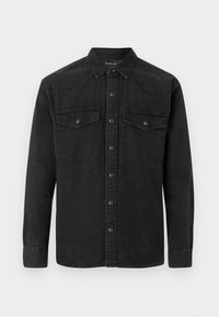 Czarna koszula dżinsowa z długimi rękawami, zapinana na guziki z dwoma kieszeniami na piersi oraz designem yoku w stylu western. Miękka tekstura, swobodny krój.