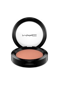 Compact rond noir avec un couvercle transparent. L'intérieur contient un blush pêche doux avec une surface texturée et une finition mate.
