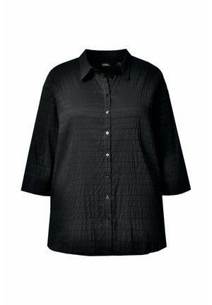 Camicia nera con trama, con bottoni e colletto, maniche a tre quarti, caratterizzata da una vestibilità morbida.