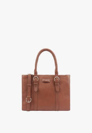 Brown leather handbag with dual handles and an adjustable strap. Features a zip closure, metal accents, and a brand logo plate on one side.