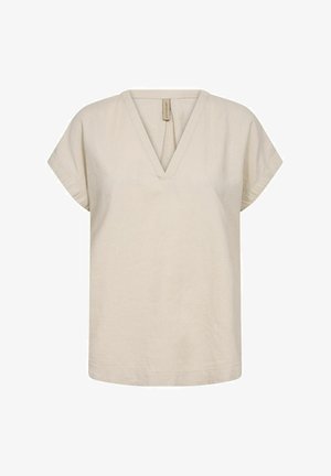 Beige pellavapaita, jossa on V-pääntie, lyhyet hihat ja rento istuvuus. Sujuva rakenne ja yksinkertainen muotoilu ilman näkyviä kuvioita tai koristeita.