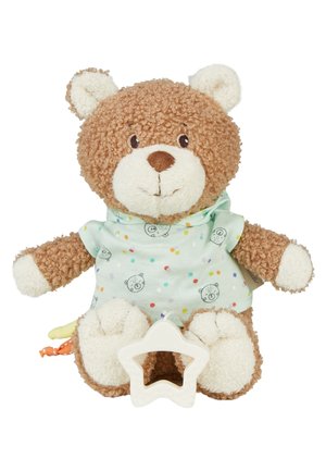 Brown curly plush teddy bear wearing a light green polka-dot shirt with bear faces, holding a white star-shaped teething toy.