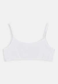 Vit bomullsbralet med smala justerbara band, slät textur och en enkel design. Har en elastisk rem för komfort och passform.