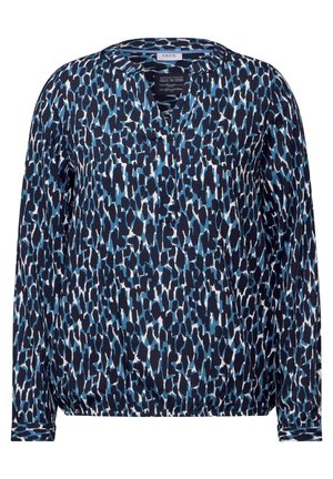Blusa a maniche lunghe con base blu navy e un motivo astratto blu e bianco, scollo a V e orlo leggermente arricciato. Tessuto morbido.