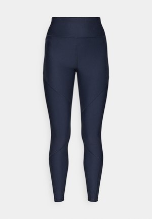 Marineblauwe legging met een hoge tailleband, met een textuurstof en hoekige ontwerpnaad. Gladde afwerking, ideaal voor sportief of casual gebruik.