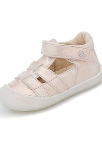 Světle růžová kožená sandál, uzavřený design, s vykrojením a suchým zipem. Bílá gumová podrážka zvyšuje stabilitu a podporu.