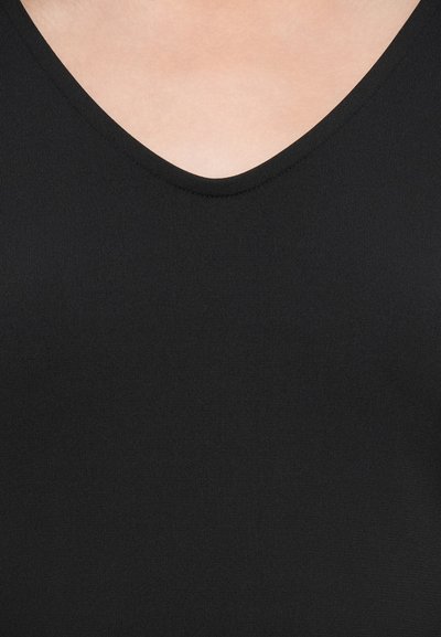Black sleeveless top featuring a V-neck design. Made of smooth, stretchy fabric with a clean finish and no visible patterns or embellishments.