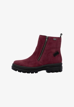 Red suede ankle boot with side zipper, black rugged sole, and looped pull tab. Features a smooth texture and a simple design.
