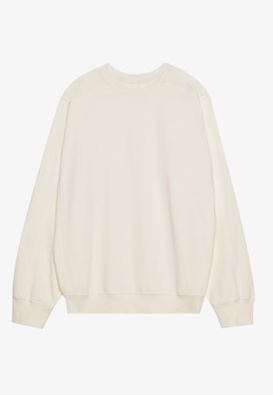 Hellbeige Sweatshirt aus einer weichen Baumwollmischung. Mit langen Ärmeln, Rundhalsausschnitt und gerippten Bündchen sowie Saum im entspannten Schnitt.