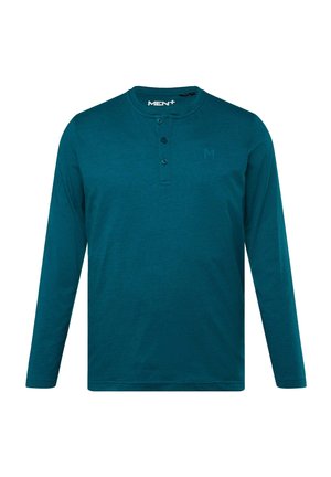 Teal lange mouw shirt van zacht materiaal met een ronde hals, een drieknoopsluiting en een klein logo op de linkerborst.