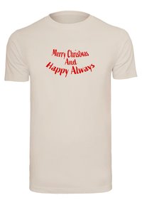 Light beige cotton T-shirt featuring red text that reads “Merry Christmas And Happy Always” arranged in a curved design. Regular fit.
