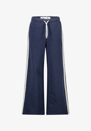 Navyblauwe wijduitlopende joggingbroek met witte strepen aan de zijkant en een witte trekkoord in een elastische tailleband.