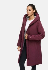 Maroon long coat with a large hood, front zipper, and snap buttons, featuring a soft inner lining and a straight cut design.