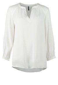 Vit blus i lättviktsmaterial, med V-ringning, långa ärmar med elastiska manschetter och strukturerade axlar för extra detalj.