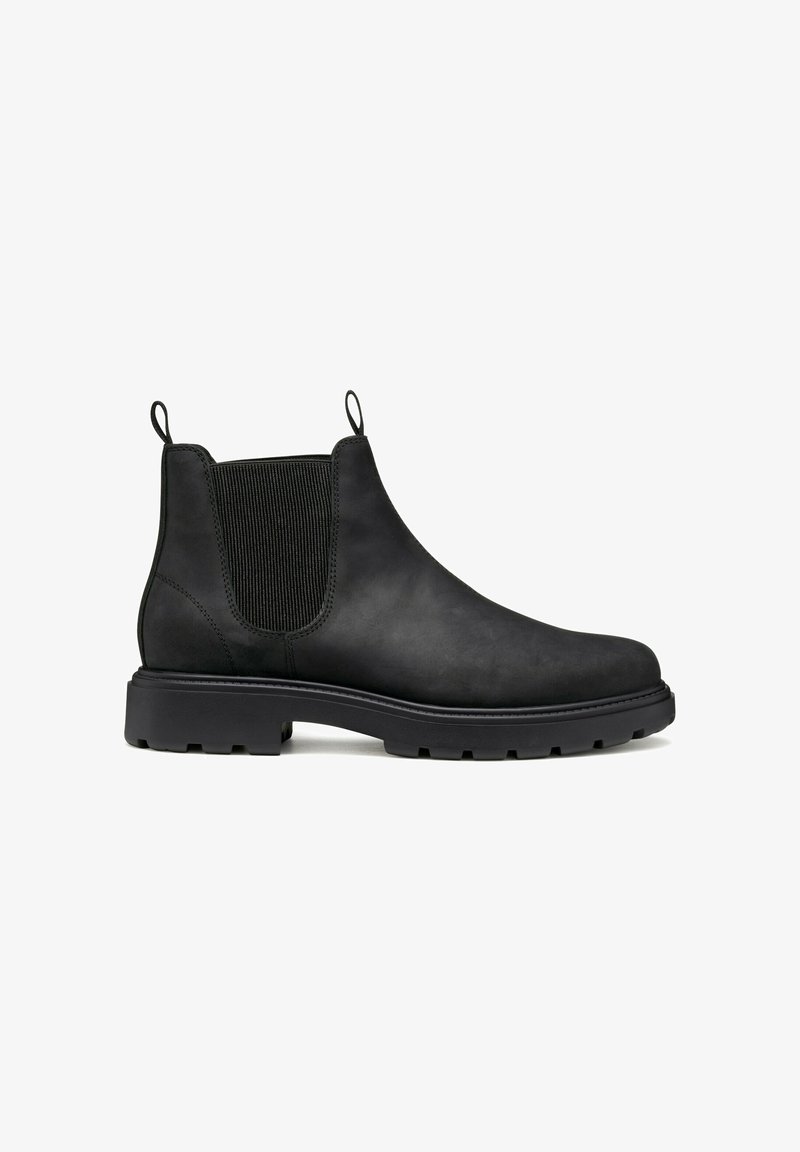 Botas Chelsea de cuero negro con paneles laterales elásticos, tiradores y suelas de goma resistentes. Textura suave, diseño de altura hasta el tobillo.