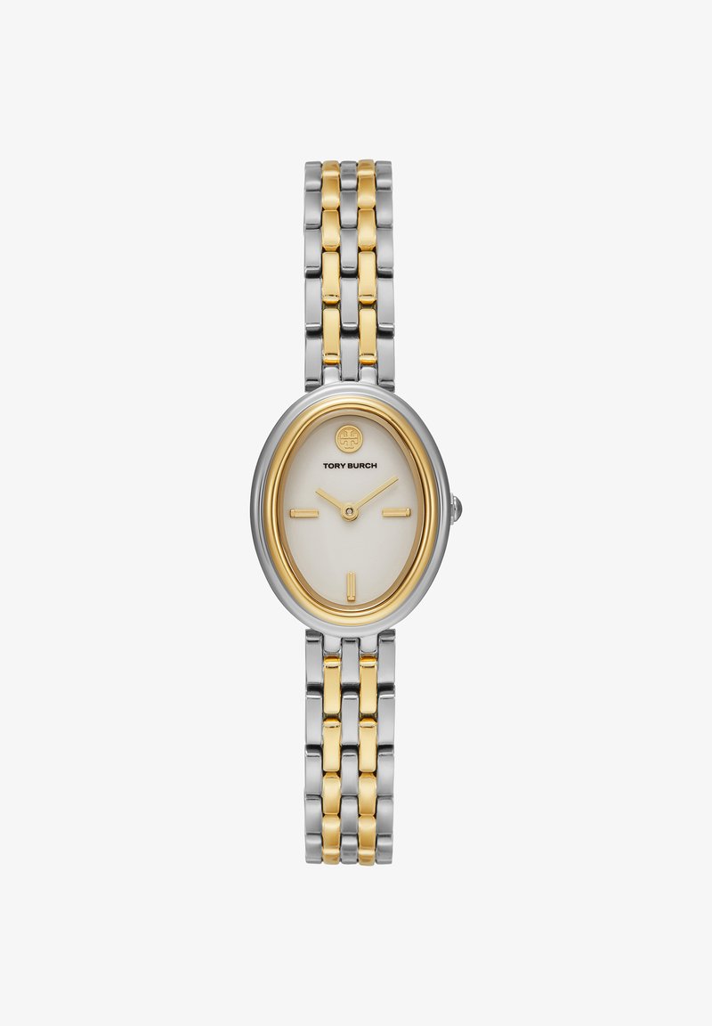 Montre-bracelet ovale Tory Burch avec un bracelet à maillons bicolores argent et or et un cadran blanc avec des index et des aiguilles dorés.