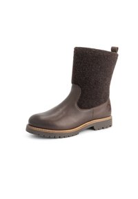 Bruine leren enkellaars met een zachte, textuurvolle donkerbruine wollen bovenkant. Voorzien van een stevige rubberen zool en een decoratieve stiksel detail.