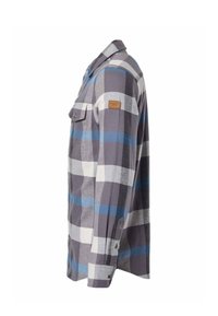 Chemise à carreaux gris, bleu et blanc à manches longues avec une poche poitrine boutonnée et un petit patch marron sur le haut du bras, vue de côté.
