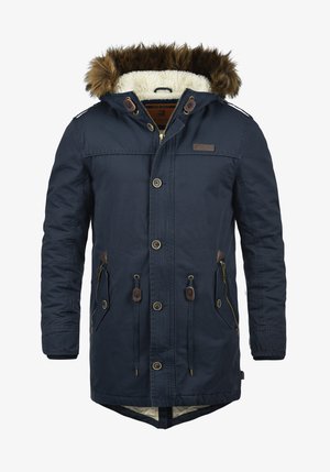 Marineblaue Parka-Jacke mit einem Kapuzenfutter aus Kunstfell, ausgestattet mit einem Reißverschluss, zwei Seitentaschen und braunen Lederakzenten. Innen mit Fleece gefüttert.