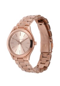 Rose-guld armbåndsur med en glat, rund kasse, minimalistisk urskive og et sammenlåst metalled-armbånd. Slankt design uden synlige mønstre.