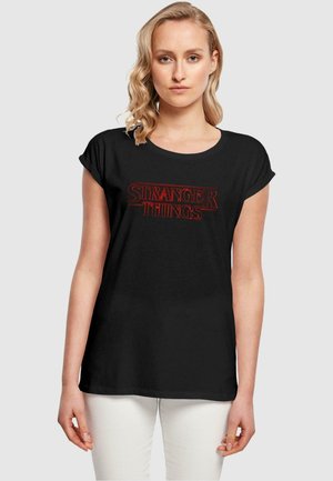 STRANGER THINGS - GLOW LOGO - T-shirts print - black