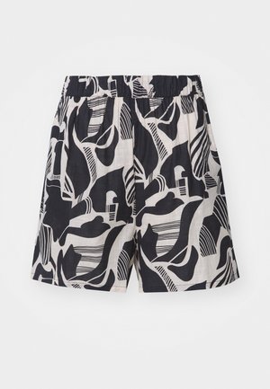 Pantalones cortos a rayas en negro y crema con diseños abstractos, cintura elástica y un ajuste holgado, confeccionados en tejido ligero.