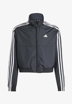 Sort croppet træningsjakke med lynlås, hvide Adidas-striber på ærmerne og logo på venstre bryst, elastiske manchetter og talje.