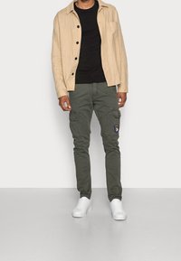 Tommy Hilfiger Långärmad tröja - black