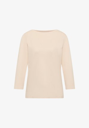 Beżowa koszulka z długim rękawem wykonana z miękkiej bawełny. Posiada dekolt w kształcie łódki oraz luźny krój, z przeszytymi brzegami i bez wzorów.