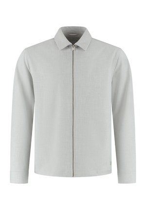 Lysegrå genser med glidelås, krage, lange ermer og subtilt teksturert stoff. Har glidelåslukking foran og en logo ved kanten.