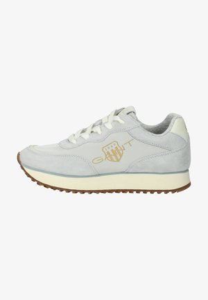Light gray suede sneaker with white laces, rubber sole, and gold logo detail on the side. Rounded toe and cushioned collar for comfort.