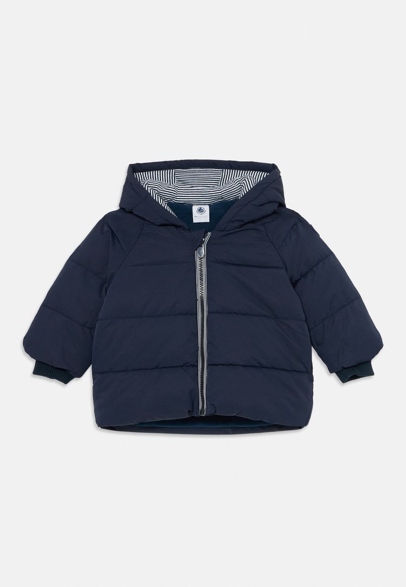 Giacca imbottita blu navy per bambini piccoli, con cappuccio, cerniera frontale e fodera a strisce all'interno del cappuccio.