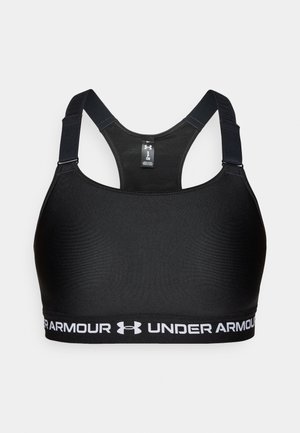 Sort sports-BH med tekstureret finish, racerback-design og justerbare stropper. Har en bred, hvid linning med "UNDER ARMOUR"-branding.