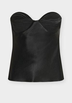 Sort stropløs top med formsyet ribbet detalje ved brystet. Glat, skinnende stof med en tætsiddende silhuet og lige kant.