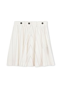 Jupe blanche plissée à fines rayures verticales noires, avec trois boutons noirs à la taille et des passants pour ceinture.